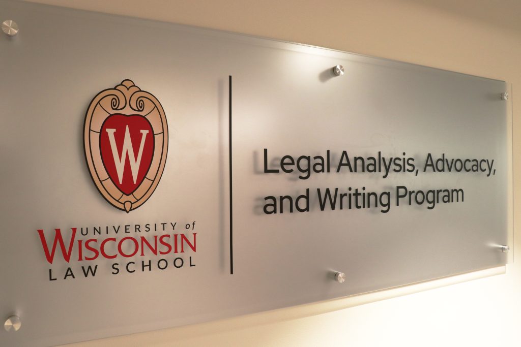 A sign that reads Legal Analysis, Advocacy, and Writing Program.