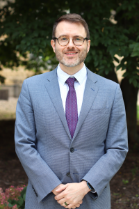 Photo of BJ Ard, a middle-aged man with light skin, brown hair, glasses, and a light, graying beard.