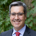 Dean Dan Tokaji smiling.