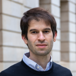 Photo of young man with dark hair.