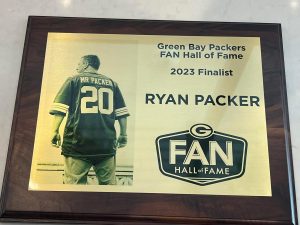 A plaque of Ryan Packer showing his dedication as a fan in the Packer's Hall of Fame.