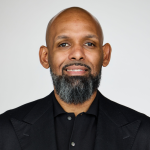 Photo of black man with beard.