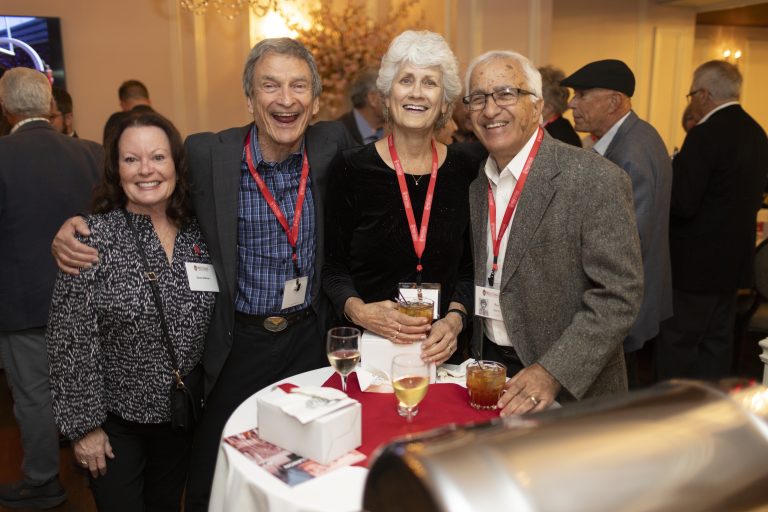 A group of senior folks at a reunion gathering.