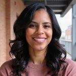 photo of beautiful young black woman with long flowing black hair and a warm smile