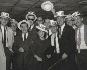 group of students with cane toss hats and canes