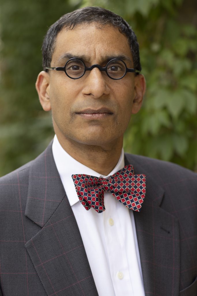 A headshot photo of Anuj Desai.
