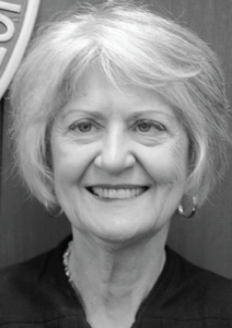 A black and white headshot photo of Joan Lefkow