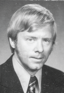 Black and white headshot photo of Robert Adolph
