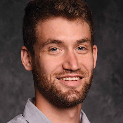 A headshot image of Jacob Lindenbaum smiling