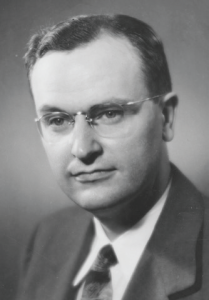 A black and white headshot photo of Thomas Fairchild