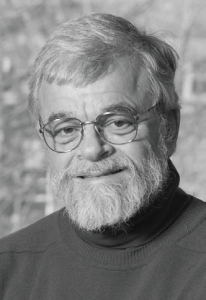 A black and white headshot photo of William Whitford