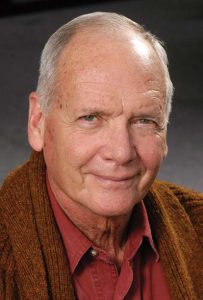 A headshot photo of former Dean Cliff Thompson.