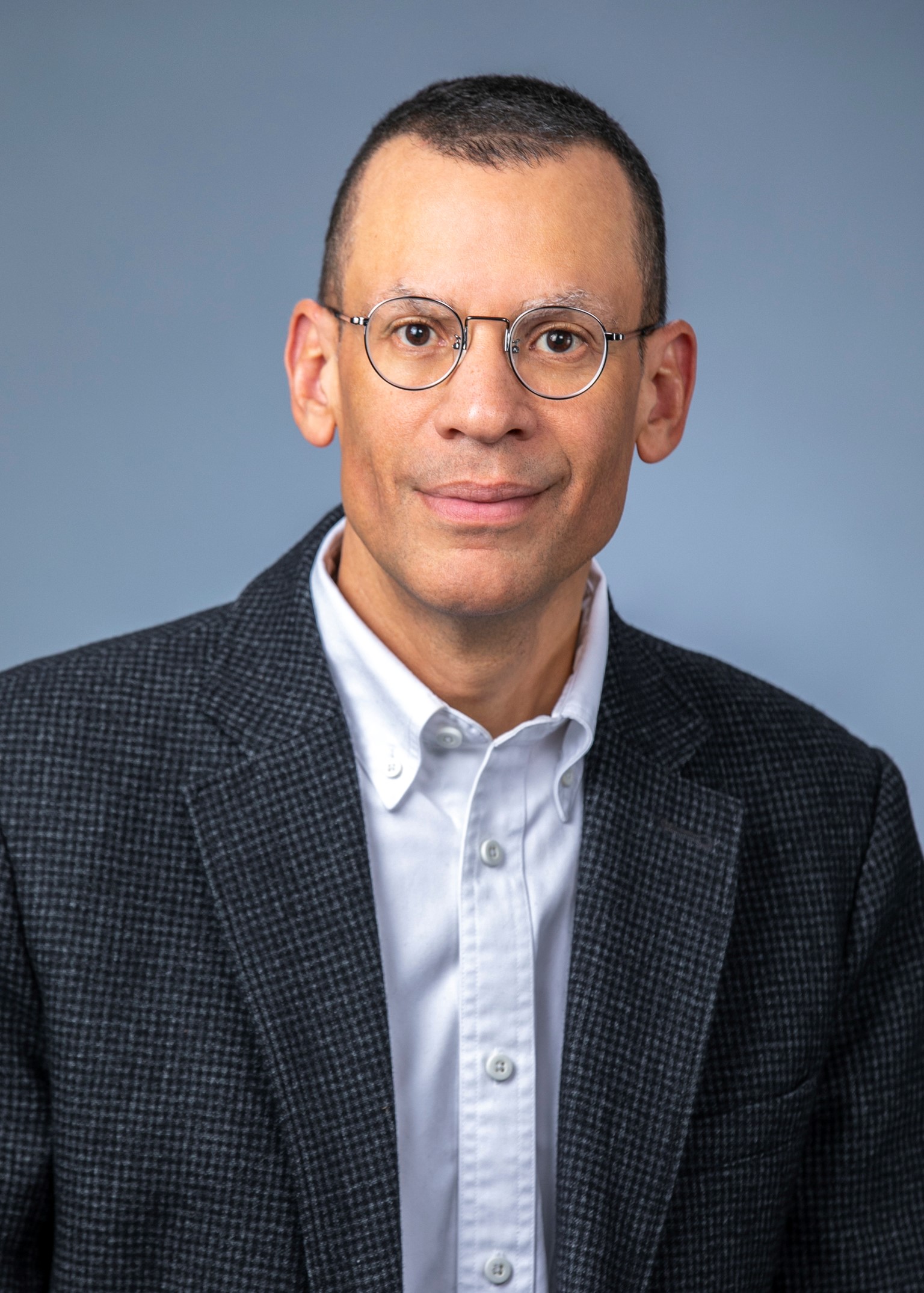A headshot photo of Ahmed White