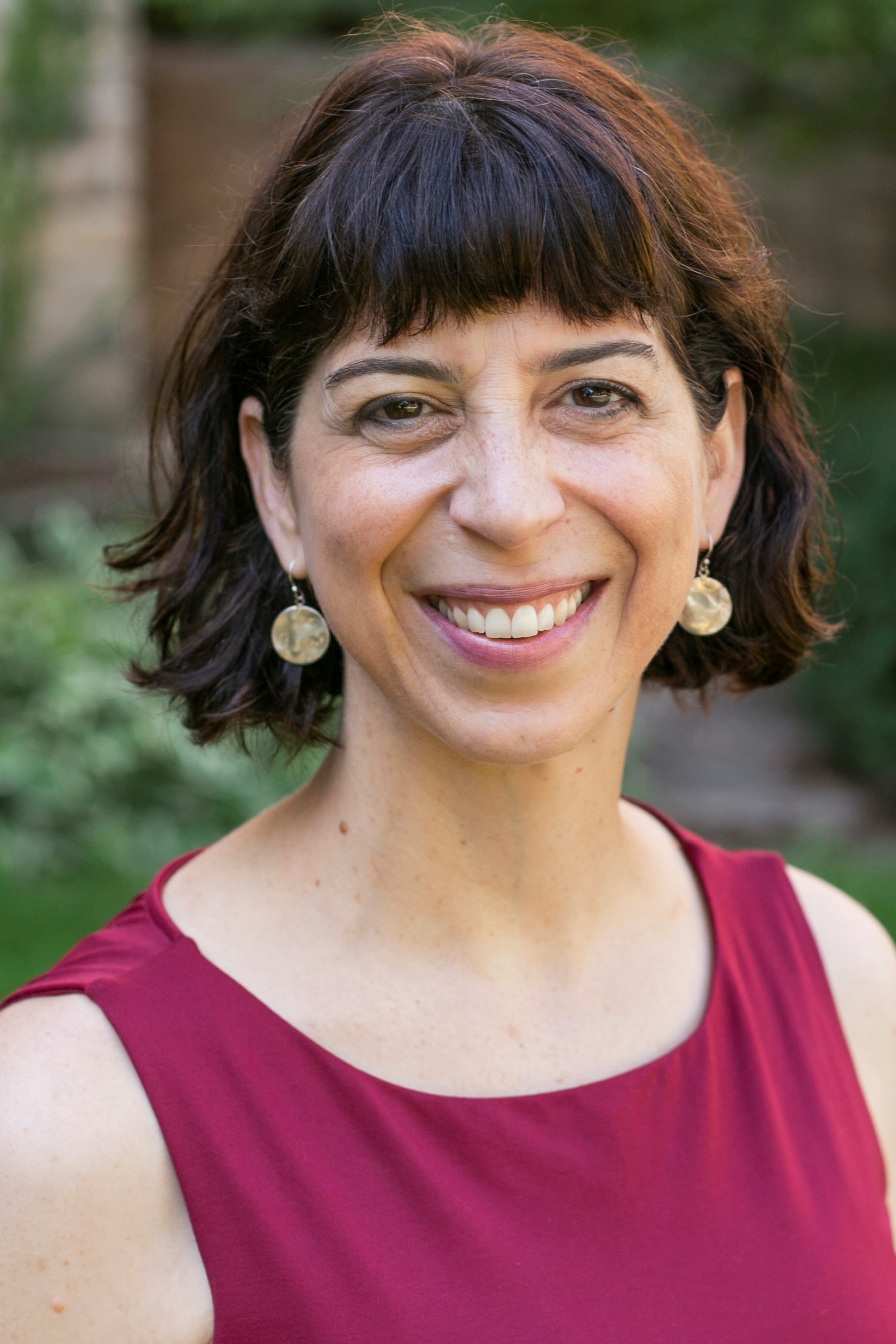 A headshot photo of Mitra Sharafi