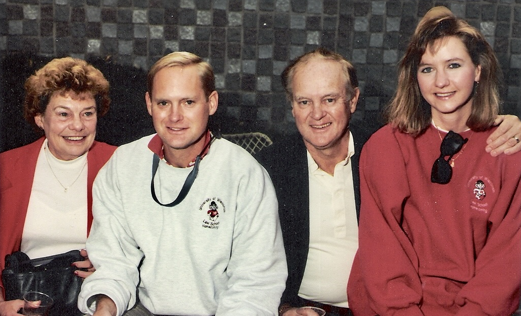 Tom and Joan Stafslien sit with older family members before a football game.