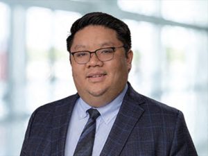 Headshot photo of Danny Tang.