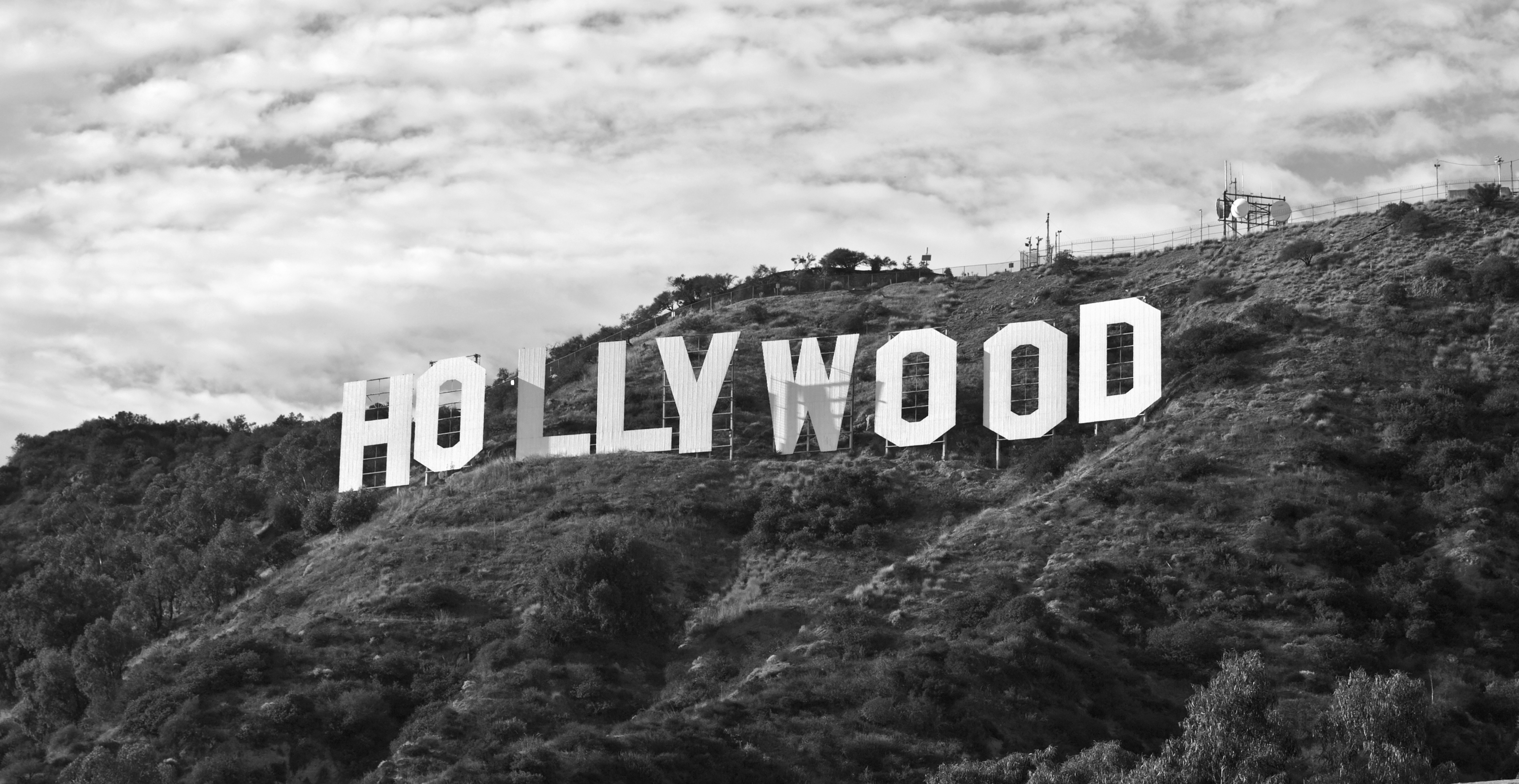A black and white image of the Hollywood sign in California.