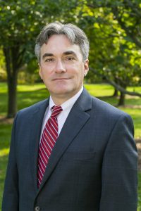 Headshot photo of John Gross.