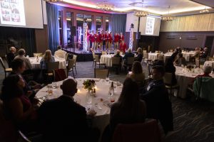 The men's student a'capela group performs to the reunion crowd.