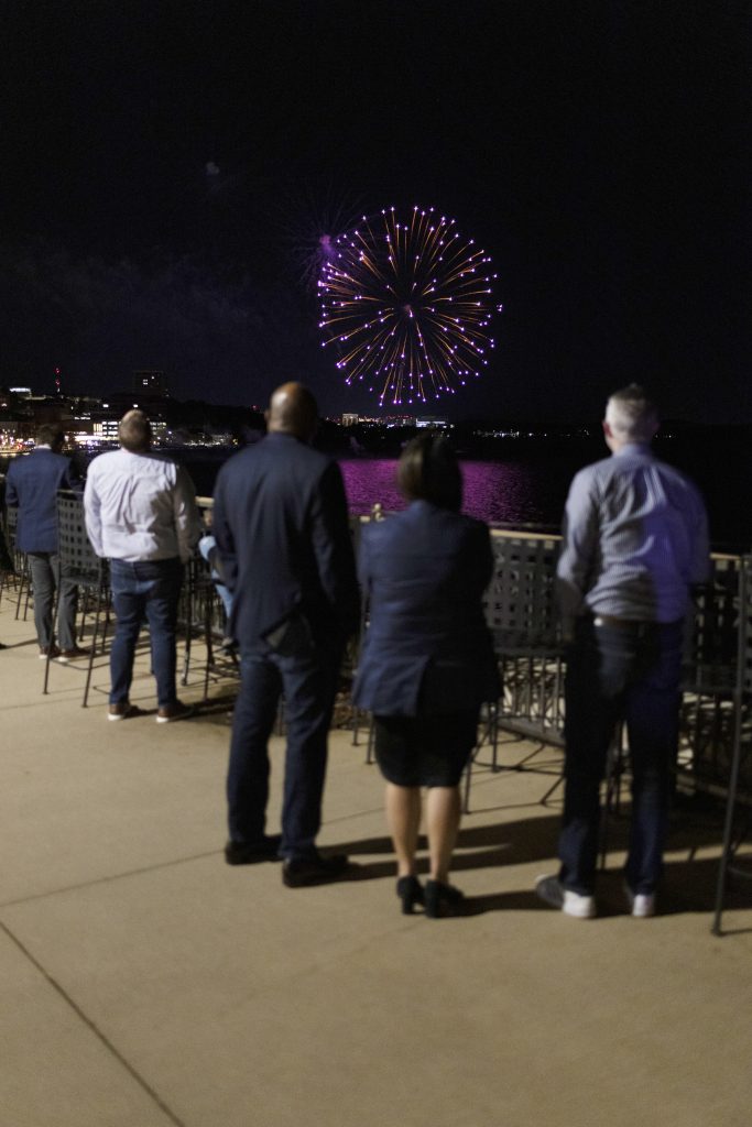 Photo of fireworks bursting over the lake as seen from the Monona Terrace.