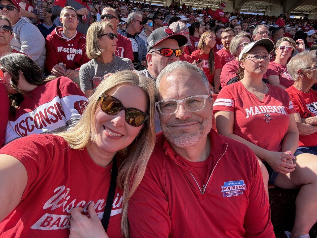 Sara and Dave Waters at a UW football game.