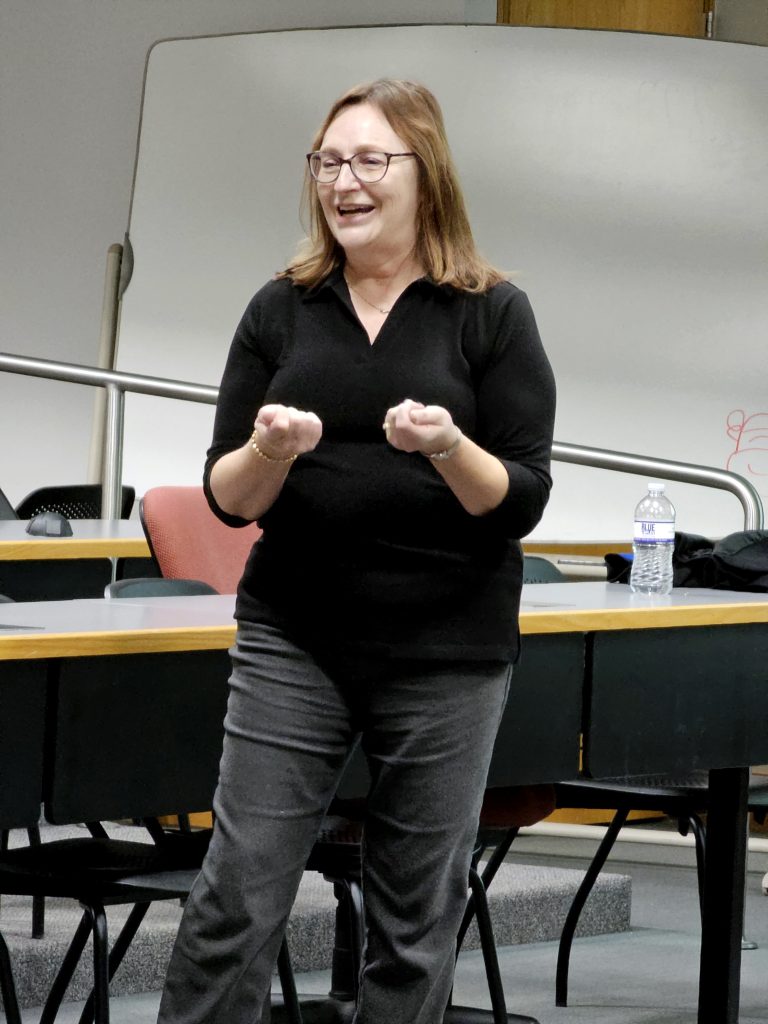Photo of Sarah Orr presenting.