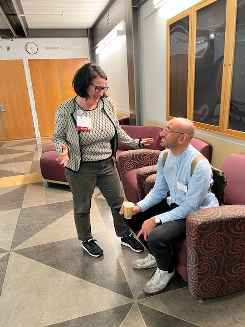 Participants chat at the Midwest Clinical Conference.