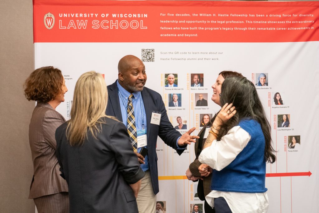 Photo of the Hastie Fellows chatting.