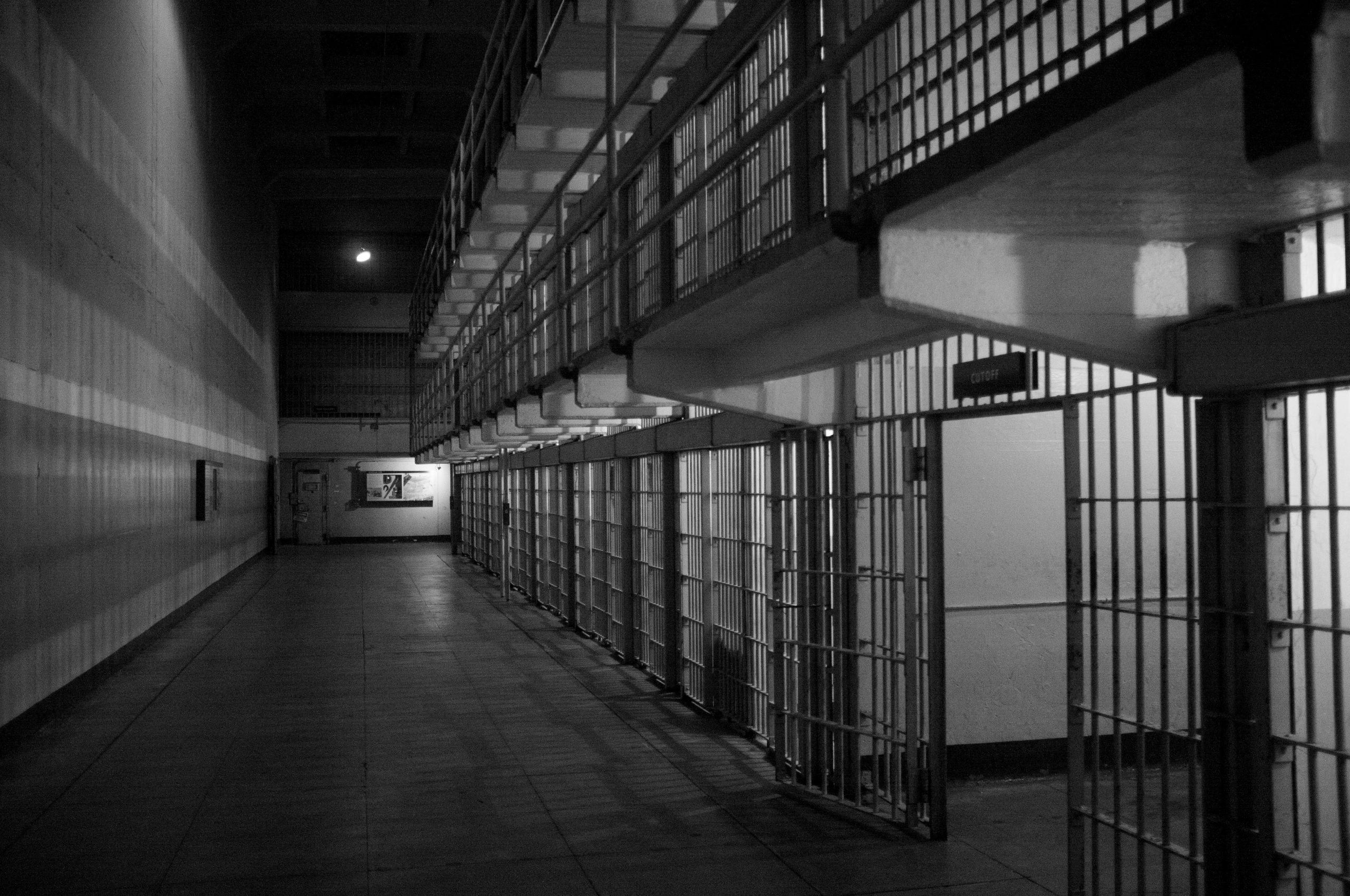 Black and white photo of prison interior.